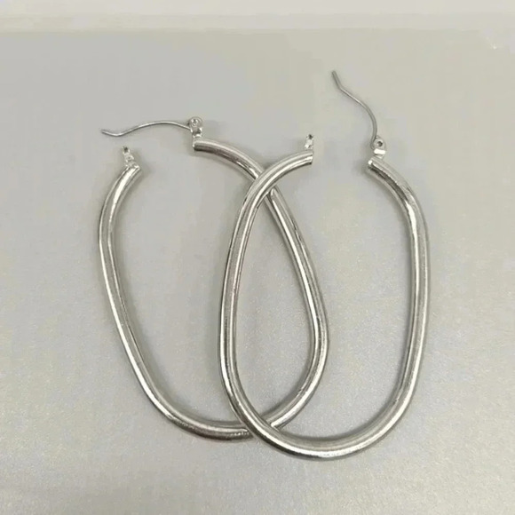 #426 Silver tone hoop earring - Picture 3 of 3